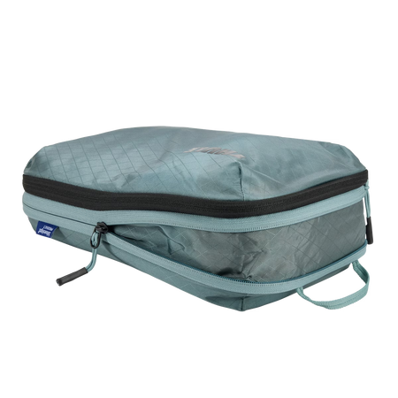 Półprzezroczysty pokrowiec Thule Compression Packing Cube – szary staw, średni