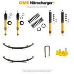 Zestaw zawieszenia OME Nitrocharger+ – Hilux Revo 2016–2025, 20/40 mm, lekki przód, stałe 300 kg z tyłu, wielopiórowe, mocniejsze tłumienie przodu, mocniejsze tłumienie tyłu – bez dystansu przewodów hamulcowych