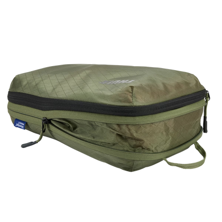 Półprzezroczysty pokrowiec Thule Compression Packing Cube – miękka zieleń, średni