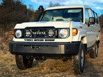 Zestaw lamp LED do grilla Lazer Lamps 2 × Sentinel 7 Elite — Toyota Land Cruiser 70 (2023+)