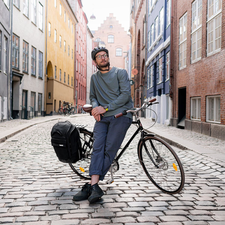 Hybrydowa sakwa rowerowa i plecak Thule Paramount 26 l – zielona soft green