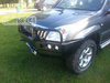 FABRYKA 4X4 ZDERZAK PRZÓD Z BULLBAREM DO WERSJI Z PLASTIKOWYMI POSZERZENIAMI NADKOLI TOYOTA LAND CRUISER J125