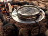 Grill biwakowy Front Runner Braai z transportem na kole zapasowym